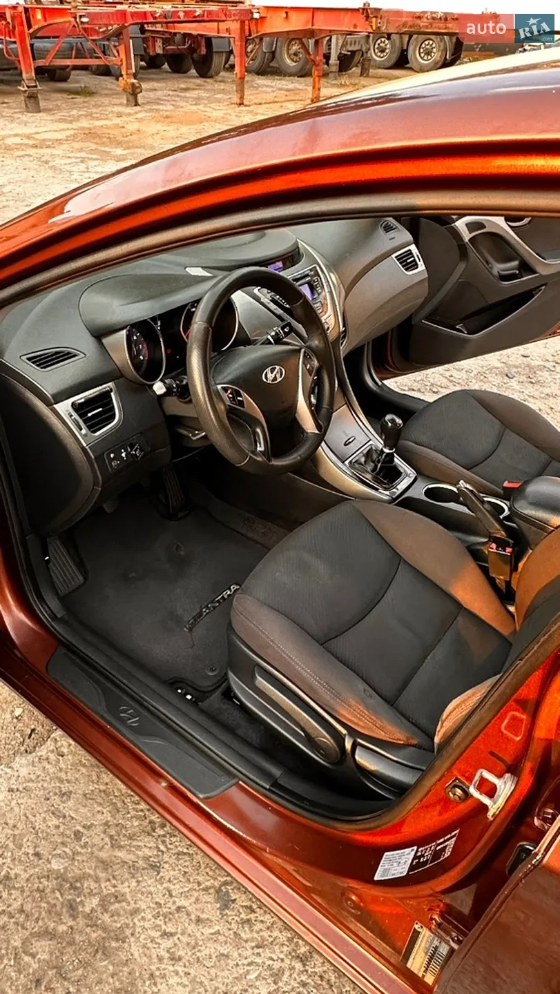 Hyundai Elantra 2013 VIN KMHDH41CADU691868 фото оголошення 9 з 26
