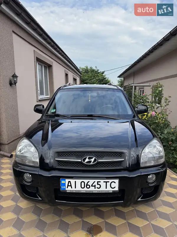 Hyundai Tucson 2008 VIN KMHJN81BP8U921572 фото оголошення 13 з 46