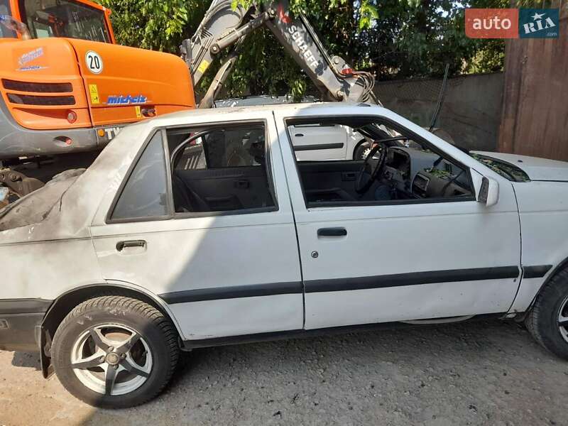 Седан Isuzu Gemini 1989 в 