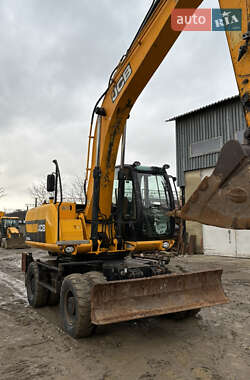 Колесный экскаватор JCB 160 2011 в 