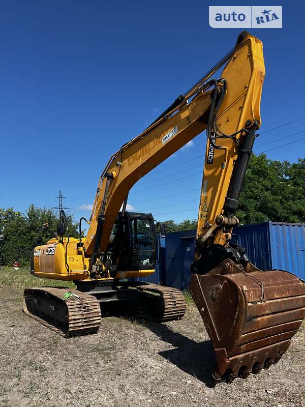 Экскаватор погрузчик JCB 220LC Xtra 2013 в 