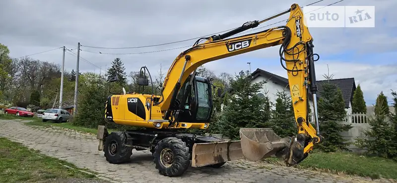 Колесный экскаватор JCB JS 145 2012 в 