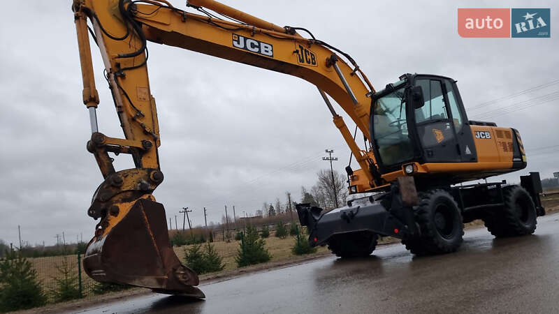 Колесный экскаватор JCB JS 200 2005 в Беляевке