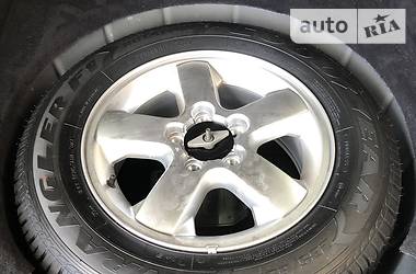 Внедорожник / Кроссовер Jeep Grand Cherokee 2004 в 