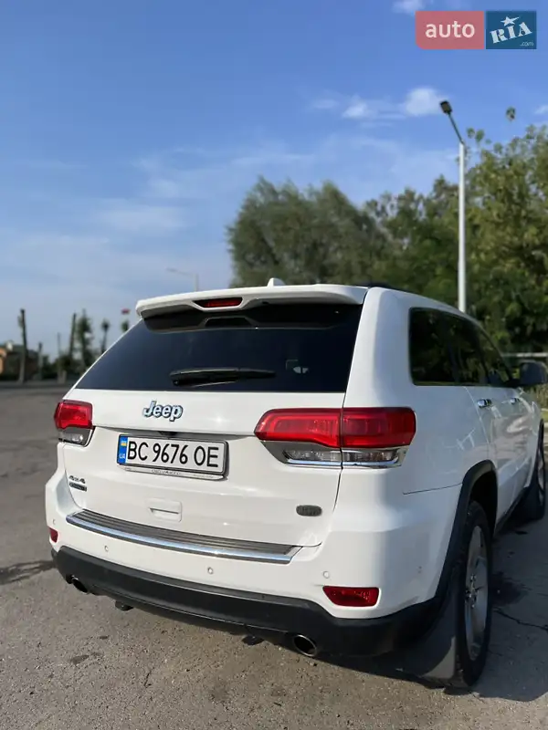 Jeep Grand Cherokee 2013 VIN 1C4RJFBM5EC168911 фото оголошення 4 з 45