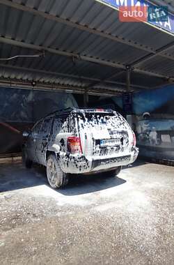 Внедорожник / Кроссовер Jeep Grand Cherokee 2000 в 
