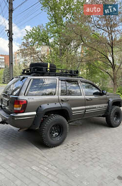 Внедорожник / Кроссовер Jeep Grand Cherokee 2000 в 