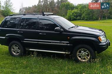 Внедорожник / Кроссовер Jeep Grand Cherokee 2004 в 