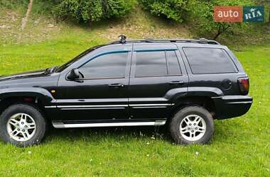 Внедорожник / Кроссовер Jeep Grand Cherokee 2004 в 