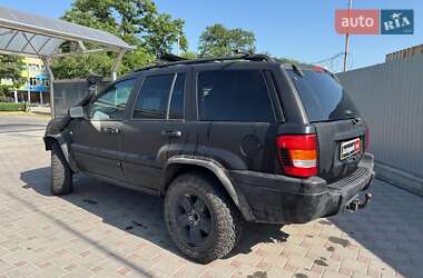 Внедорожник / Кроссовер Jeep Grand Cherokee 2002 в 