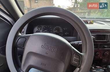 Внедорожник / Кроссовер Jeep Grand Cherokee 2000 в 
