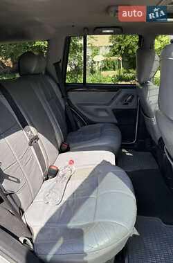 Внедорожник / Кроссовер Jeep Grand Cherokee 2003 в 