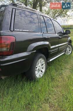 Внедорожник / Кроссовер Jeep Grand Cherokee 2004 в 
