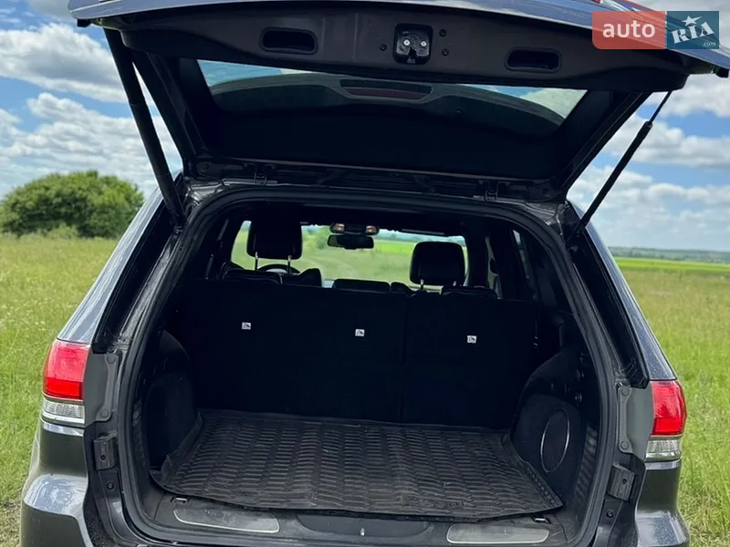 Jeep Grand Cherokee 2014 VIN 1C4RJFBM9EC399424 фото оголошення 10 з 57
