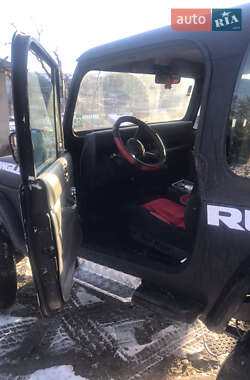 Внедорожник / Кроссовер Jeep Wrangler 1991 в 