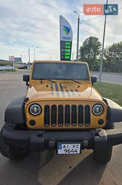 Внедорожник / Кроссовер Jeep Wrangler 2014 в 