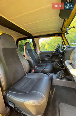 Внедорожник / Кроссовер Jeep Wrangler 1996 в 