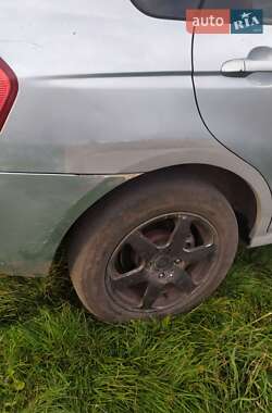 Хэтчбек Kia Cerato 2006 в  фото 7 Хэтчбек Kia Cerato 2006 в