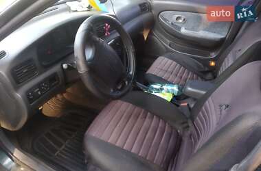 Седан Kia Clarus 2000 в 