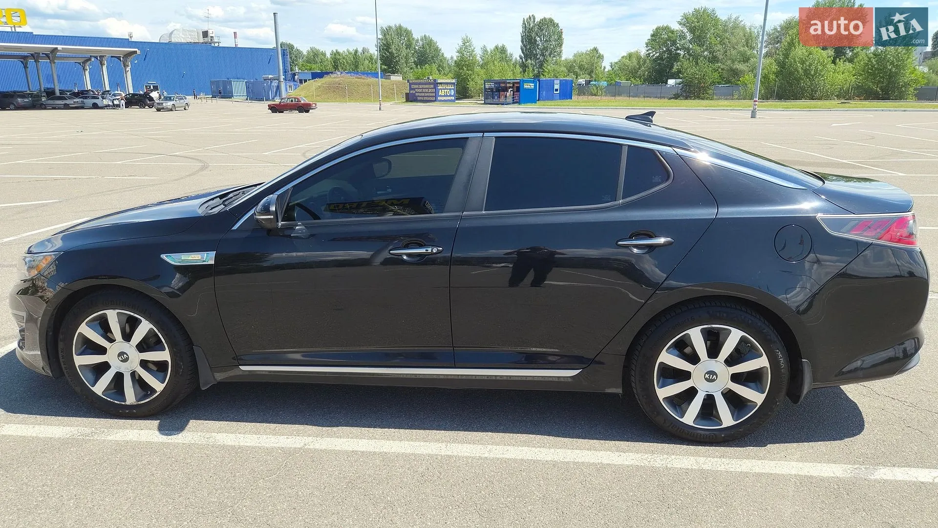 Kia Optima 2014 VIN KNAGN4ADXE5074106 фото оголошення 4 з 23