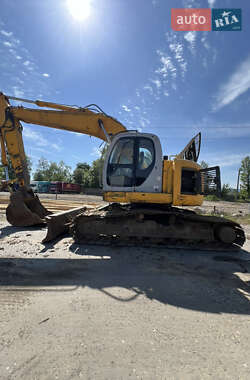 Гусеничный экскаватор Kobelco E235 BSR-2 2002 в 
