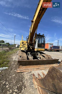 Гусеничный экскаватор Kobelco E235 BSR-2 2002 в 