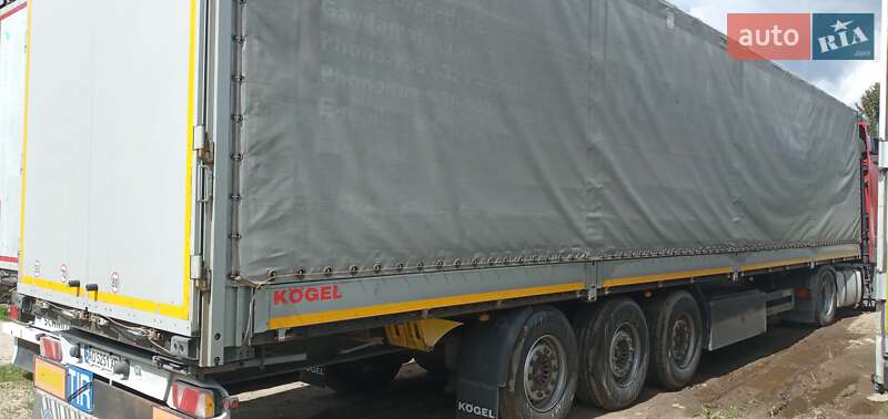 Бортовий напівпричіп Kogel SAF 2014 в Ужгороді