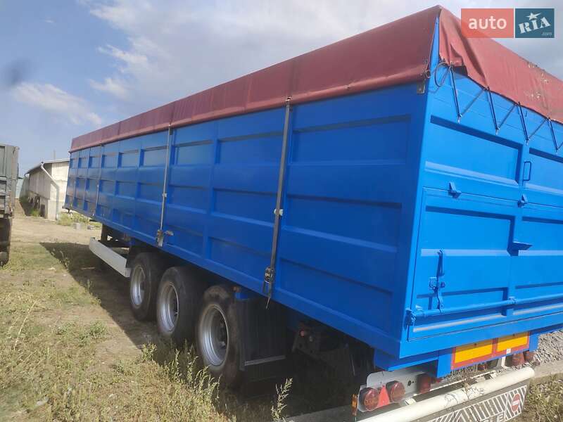Бортовой полуприцеп Krone SD 27 2009 в Сарате