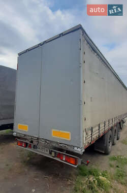 Тентованный борт (штора) - полуприцеп Krone SDP 27 2002 в 
