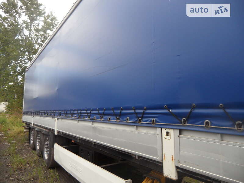 Тентованный борт (штора) - полуприцеп Krone SDP 27 2005 в Одессе