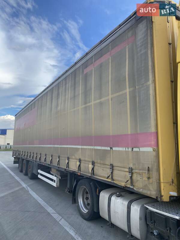 Тентованный борт (штора) - полуприцеп Krone SDP 27 2002 в 