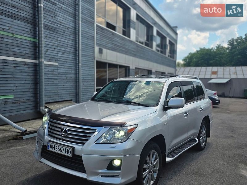 2011 Lexus LX, VIN JTJHY00W504069644:plate — фото 1 (autoria)