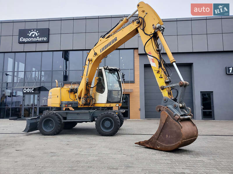Колесный экскаватор Liebherr 312 2010 в 