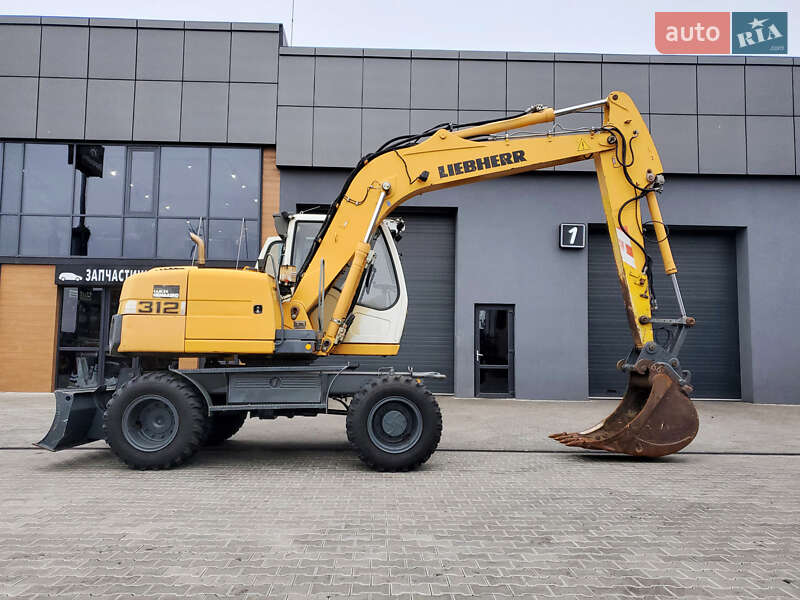 Колесный экскаватор Liebherr 312 2010 в Ровно
