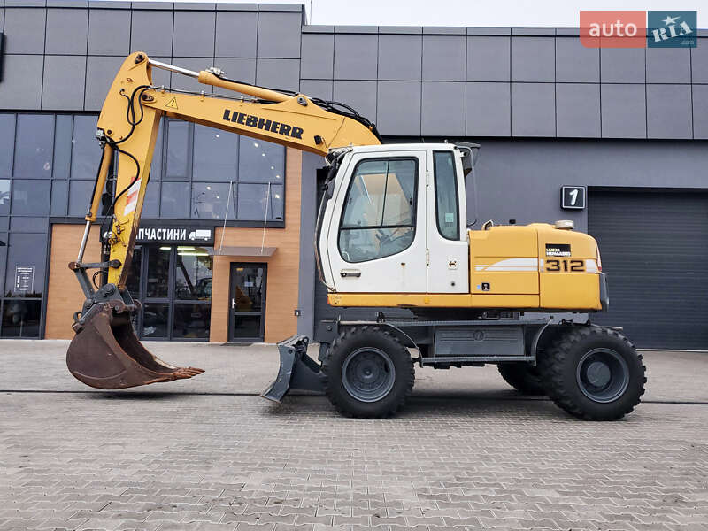 Колесный экскаватор Liebherr 312 2010 в Ровно