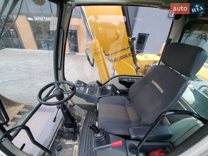 Колесный экскаватор Liebherr 312 2010 в Ровно