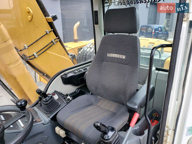 Колесный экскаватор Liebherr 312 2010 в Ровно