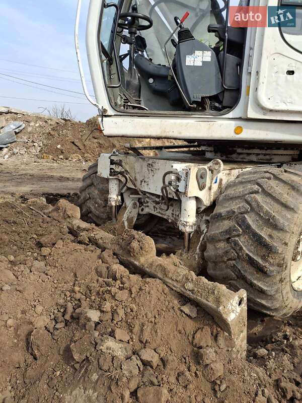 Экскаватор погрузчик Liebherr 314 2006 в Одессе