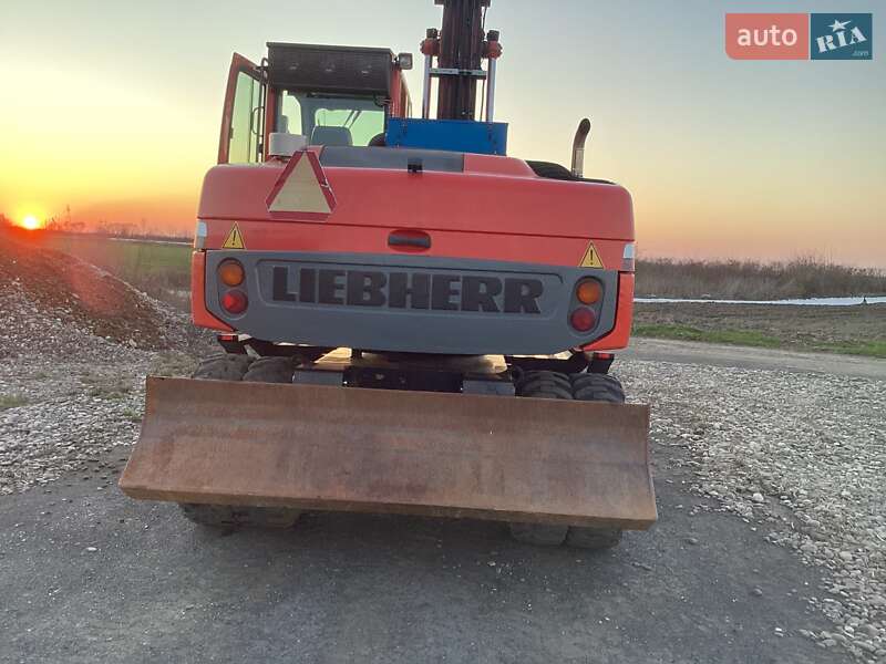 Колесный экскаватор Liebherr 314 2008 в Виноградове