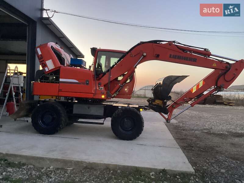 Колесный экскаватор Liebherr 314 2008 в Виноградове