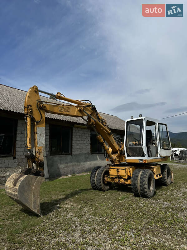Экскаватор погрузчик Liebherr A310 1993 в 