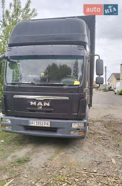 Тентований MAN 12 2011 в 