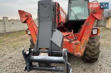 Телескопічні навантажувачі Manitou MT 2003 в 