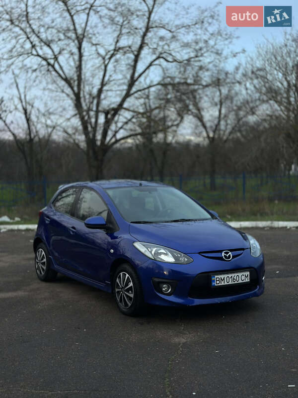 2007 Mazda 2, VIN JMZDE145280141591:plate — фото 1 (autoria)
