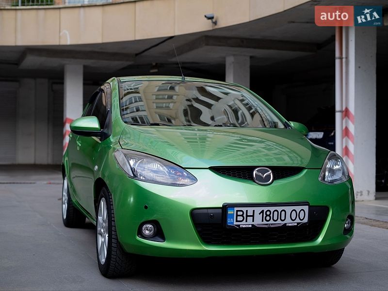 2009 Mazda 2, VIN JMZDE145500231133:plate — фото 1 (autoria)