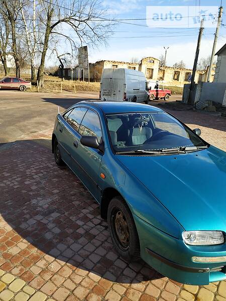 Хэтчбек Mazda 323 1998 в Глухове фото 3 Хэтчбек Mazda 323 1998 в Глухове