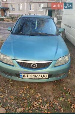Хетчбек Mazda 323 2002 в 