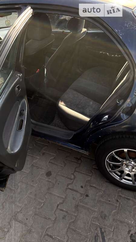 Седан Mazda 323 1997 в Одессе