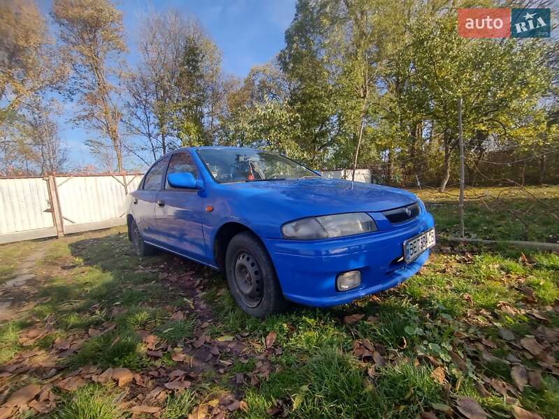 Седан Mazda 323 1997 в Христинівці фото 2 Седан Mazda 323 1997 в Христинівці