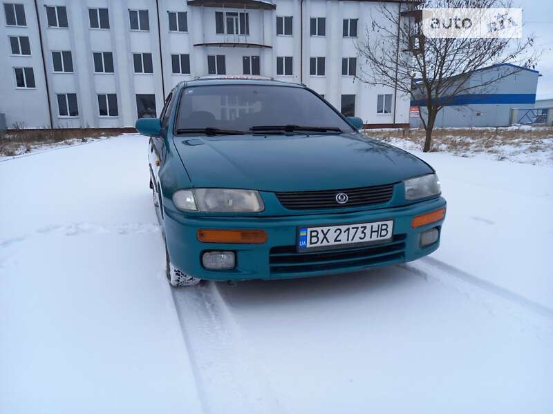 Седан Mazda 323 1996 в 